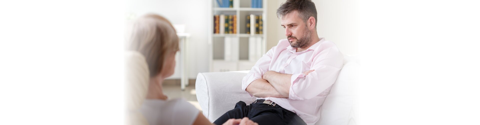 therapist doing an interview with a man