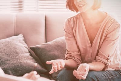 woman talking to therapist