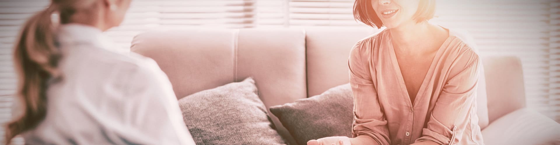 woman talking to therapist