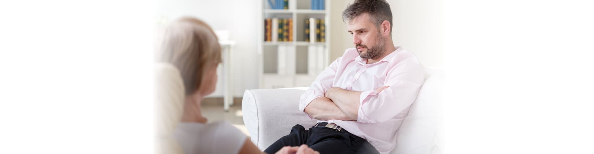 therapist doing an interview with a man